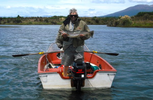Eddie in dinghy - skipper guide rowing at rear